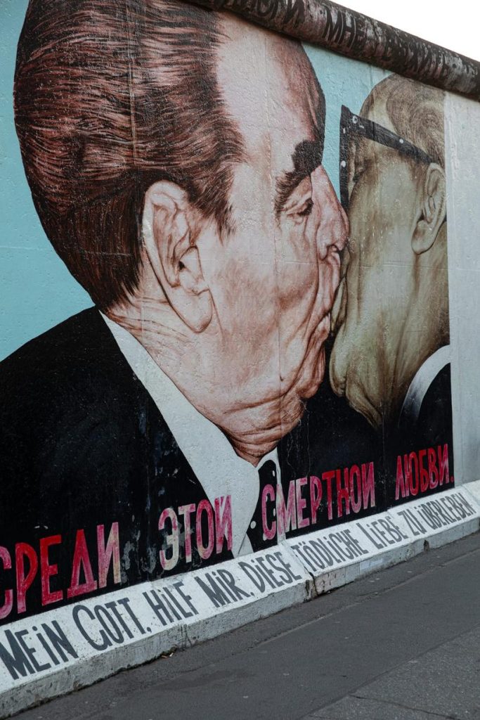Fraternal kiss art in the east side gallery in Berlin