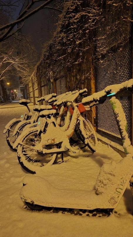 Bikes covered with snow in Berlin