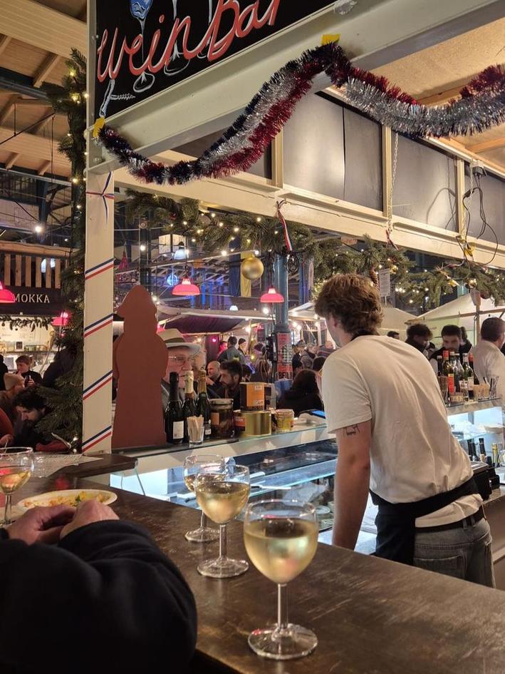 Take a wine sip in the wonderful Markthalle Neun